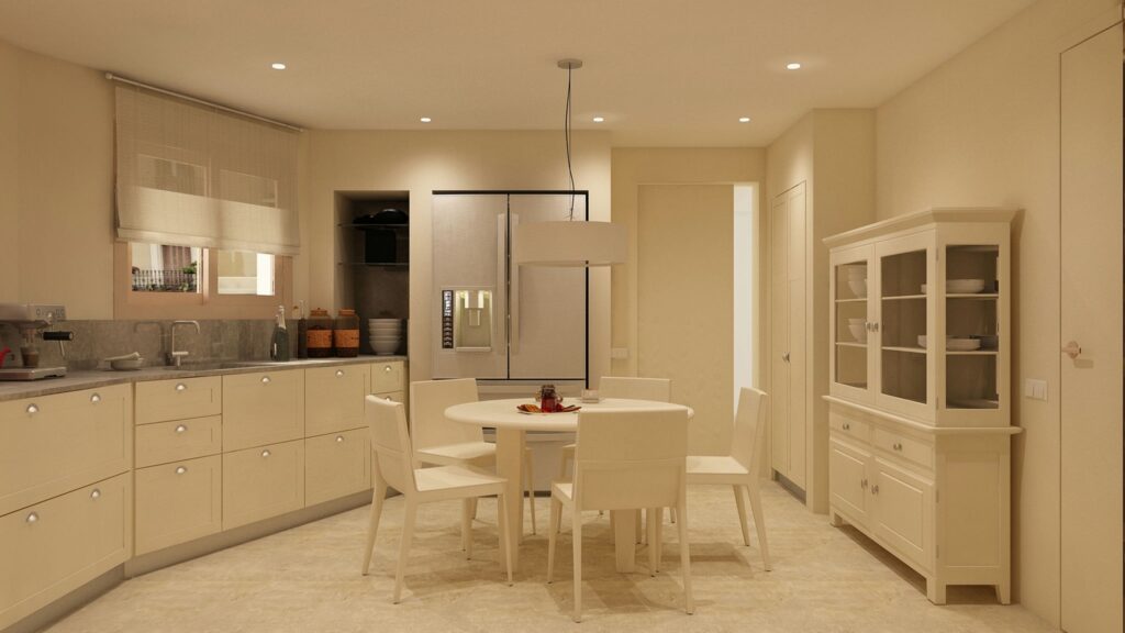 Diseño de cocina moderna en Barcelona con acabados de alta gama Cocina moderna en Barcelona con acabados de alta calidad, mueble de cocina en color crema, mesa redonda y sillas blancas, luz natural.