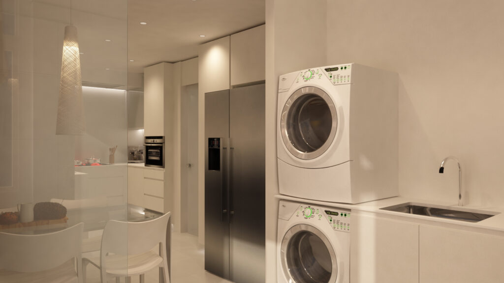 Diseño de interior moderno con área de lavandería en Barcelona Espacio interior contemporáneo en Barcelona que integra una lavandería en la cocina, con muebles de calidad y una estética minimalista.
