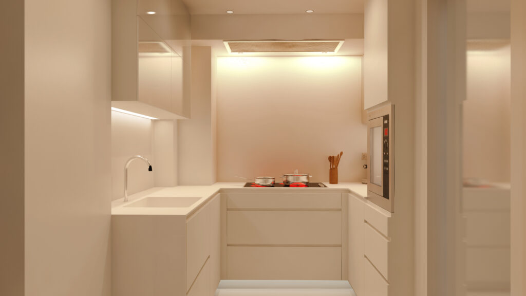 Cocina de Diseño Moderno en Barcelona con Acabados de Alta Gama Moderna cocina de diseño de interiores en Barcelona, destacando un acabado minimalista en tonos claros, con encimera de mármol y armarios de madera, iluminada de forma natural para resaltar su elegancia.