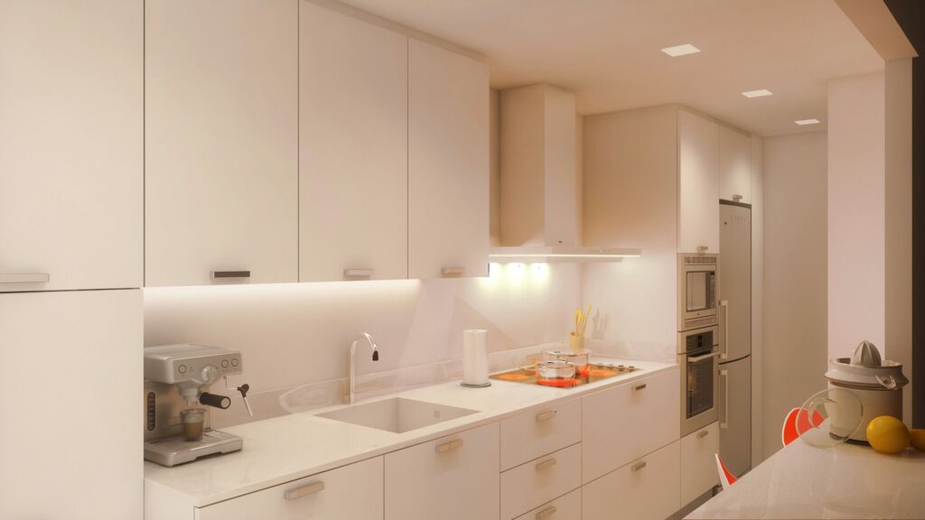 Cocina moderna y contemporánea de alta gama en Barcelona Diseño de interiores de una cocina moderna en Barcelona, con cabinetry blanco, electrodomésticos integrados, y luz natural que resalta sus acabados en mármol y distribución funcional.