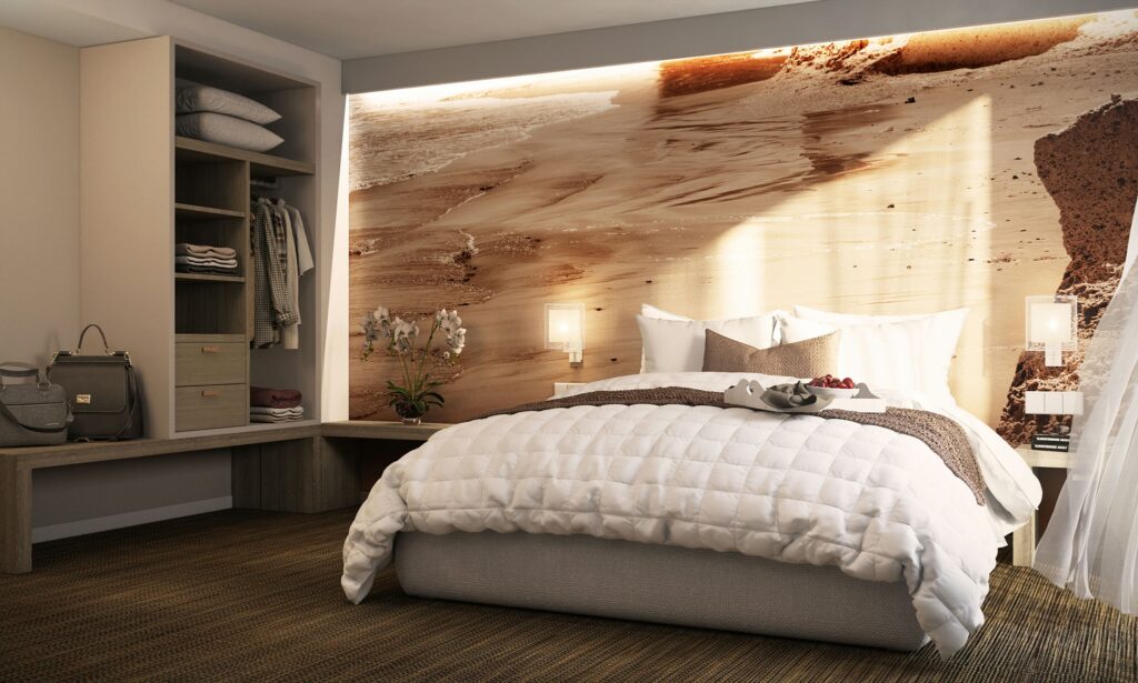 Dormitorio moderno y elegante con diseño de alta gama en Barcelona Interior de un dormitorio contemporáneo en Barcelona, con una cama grande, colcha blanca y pared con textura natural, iluminado por luz natural.