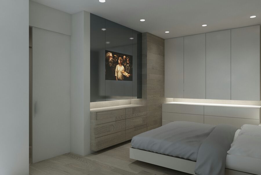 Moderno dormitorio de alta gama en Barcelona con mobiliario minimalista, cama cómoda y decoración en tonos neutros.