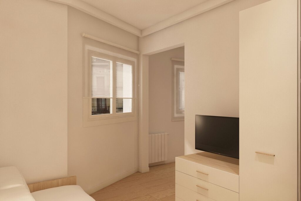 Diseño de interiores moderno en Barcelona: habitación de lujo Interior de un dormitorio moderno en Barcelona con diseño de alta gama y estética minimalista. Suelo de madera cálido, paredes claras y mobiliario a medida. Ventanas grandes que permiten la entrada de luz natural, resaltando el diseño funcional y contemporáneo.