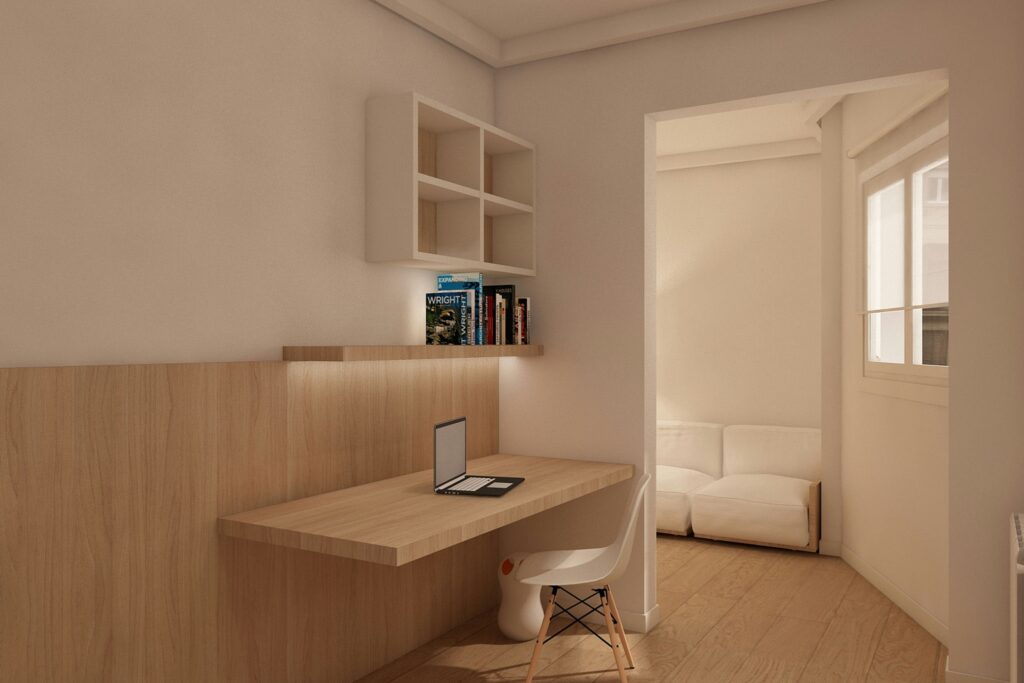Diseño de Interiores Moderno en Barcelona: Espacio de Trabajo Elegante Imágenes de un espacio de trabajo moderno en Barcelona con una mesa de madera clara, silla minimalista, estanterías flotantes repletas de libros y abundante iluminación natural a través de una ventana.