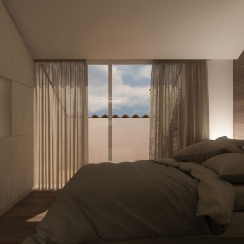 Ático en Calonge: Dormitorio moderno en Barcelona con grandes ventanas, decoración de alta gama y materiales de calidad como madera y mármol.