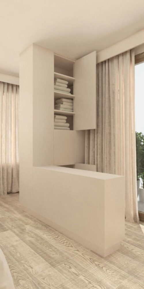 Proyecto de diseño de interiores en Barcelona que destaca una arquitectura contemporánea con suelos de madera clara, cortinas elegantes y un moderno mueble de almacenamiento, ideal para un ambiente lujoso.