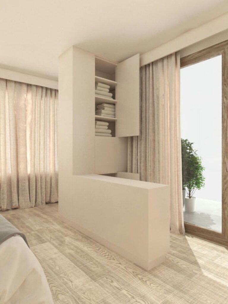 Diseño de interiores de alta gama en Barcelona con enfoque minimalista Proyecto de diseño de interiores en Barcelona que destaca una arquitectura contemporánea con suelos de madera clara, cortinas elegantes y un moderno mueble de almacenamiento, ideal para un ambiente lujoso.