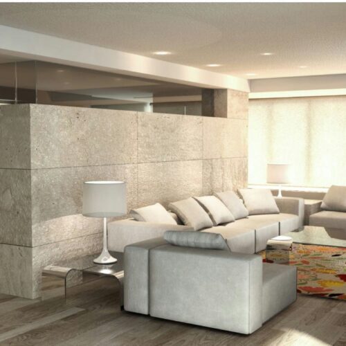 Piso en Calle Nena Casas: Salón contemporáneo: Sofá de tonos suaves, mesa de vidrio y divisor de travertino romano. Iluminación natural y diseño que integra madera de roble y mármol. Proyecto minimalista por Intersa.