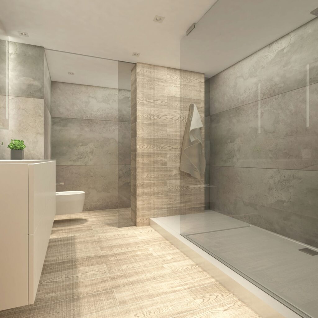 Diseño de interiores de baño moderno en Barcelona con materiales de alta calidad Interior de un baño moderno en Barcelona, destacando una combinación de madera y mármol, con una ducha espaciosa de vidrio y una iluminación cálida