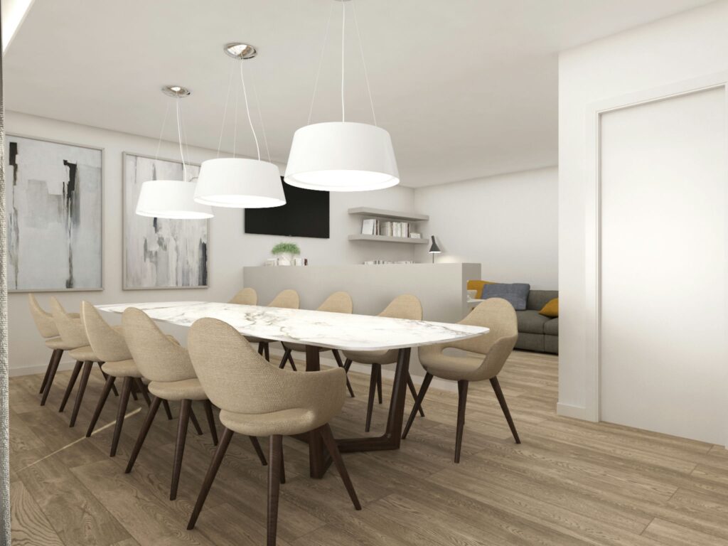 Elegante comedor moderno en proyecto de diseño interior de alta gama en Barcelona Comedor moderno en un proyecto de diseño interior de alta gama en Barcelona, con mesa de mármol y sillas tapizadas en beige. Iluminado por focos colgantes elegantes y arte contemporáneo en las paredes, con una acogedora sala de estar al fondo.