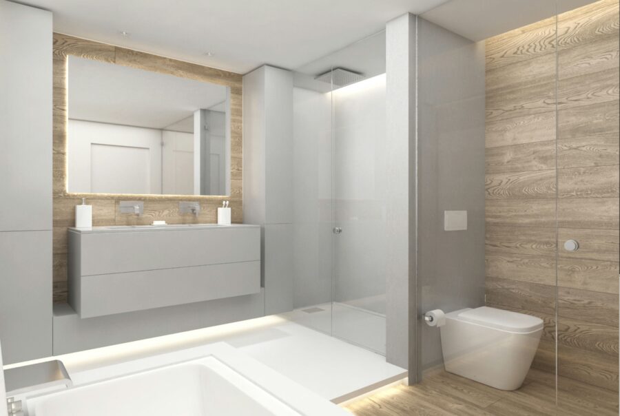 Baño contemporáneo con bañera espaciosa, muebles de madera y mármol, y una iluminación natural en una arquitectura de alta gama en Barcelona.