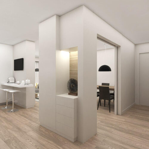 Moderno interior que destaca la arquitectura de alta gama en Barcelona, con una cocina contemporánea y elementos decorativos elegantes.
