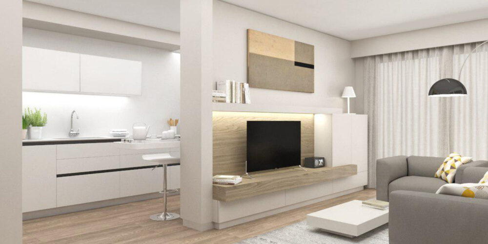 Exquisito diseño de un espacio de vida de alta gama en Barcelona, con una cocina moderna, sala de estar elegante y abundante luz natural.