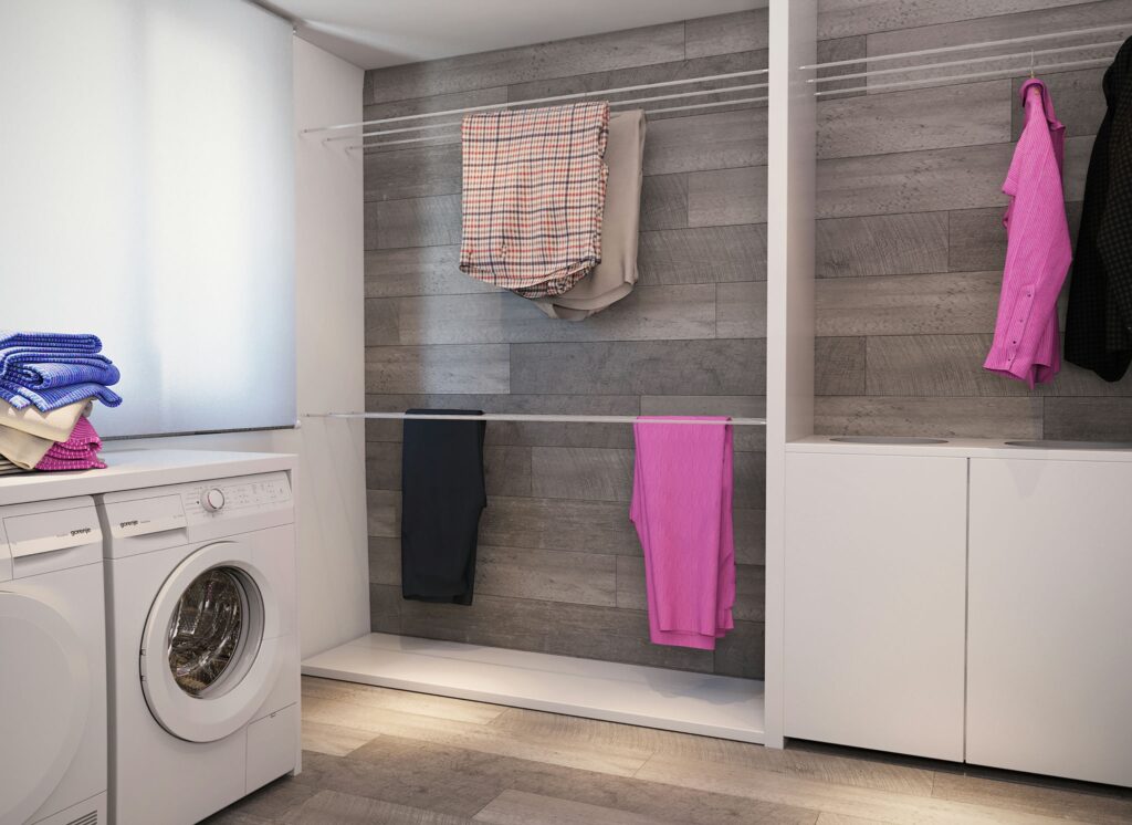 Diseño de interiores de lavandería contemporánea en Barcelona Lavandería de alta gama en Barcelona con acabados modernos, armarios elegantes y luz natural, mostrando funcionalidad y estilo.