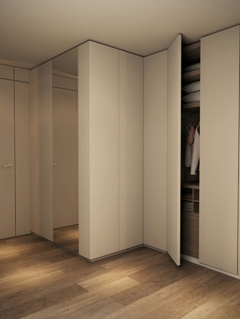 Diseño de interiores contemporáneo con gabinetes beige en Barcelona Almacenamiento moderno con gabinetes beige, superficies espejadas y suelo de madera en un interior elegante, representando arquitectura de alta gama en Barcelona.
